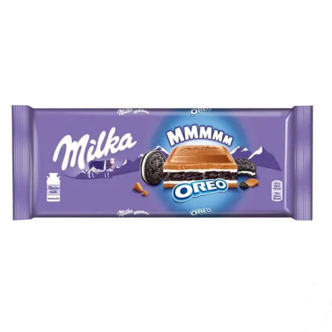Шоколад MILKA "Oreo" молочный с ванильной начинкой  и печеньем 300 г