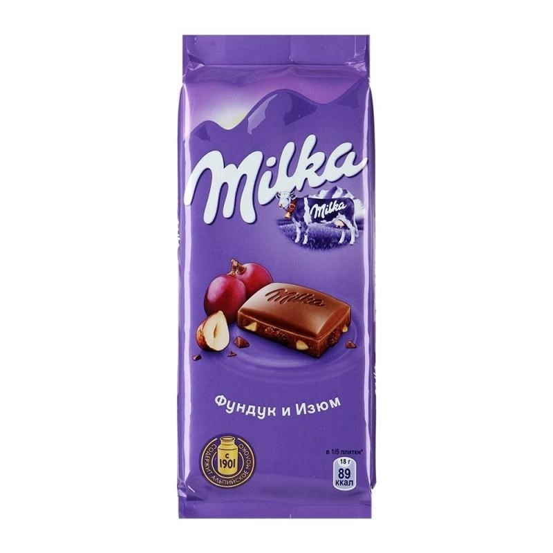 Шоколад MILKA молочный с фундуком и изюмом 85 г